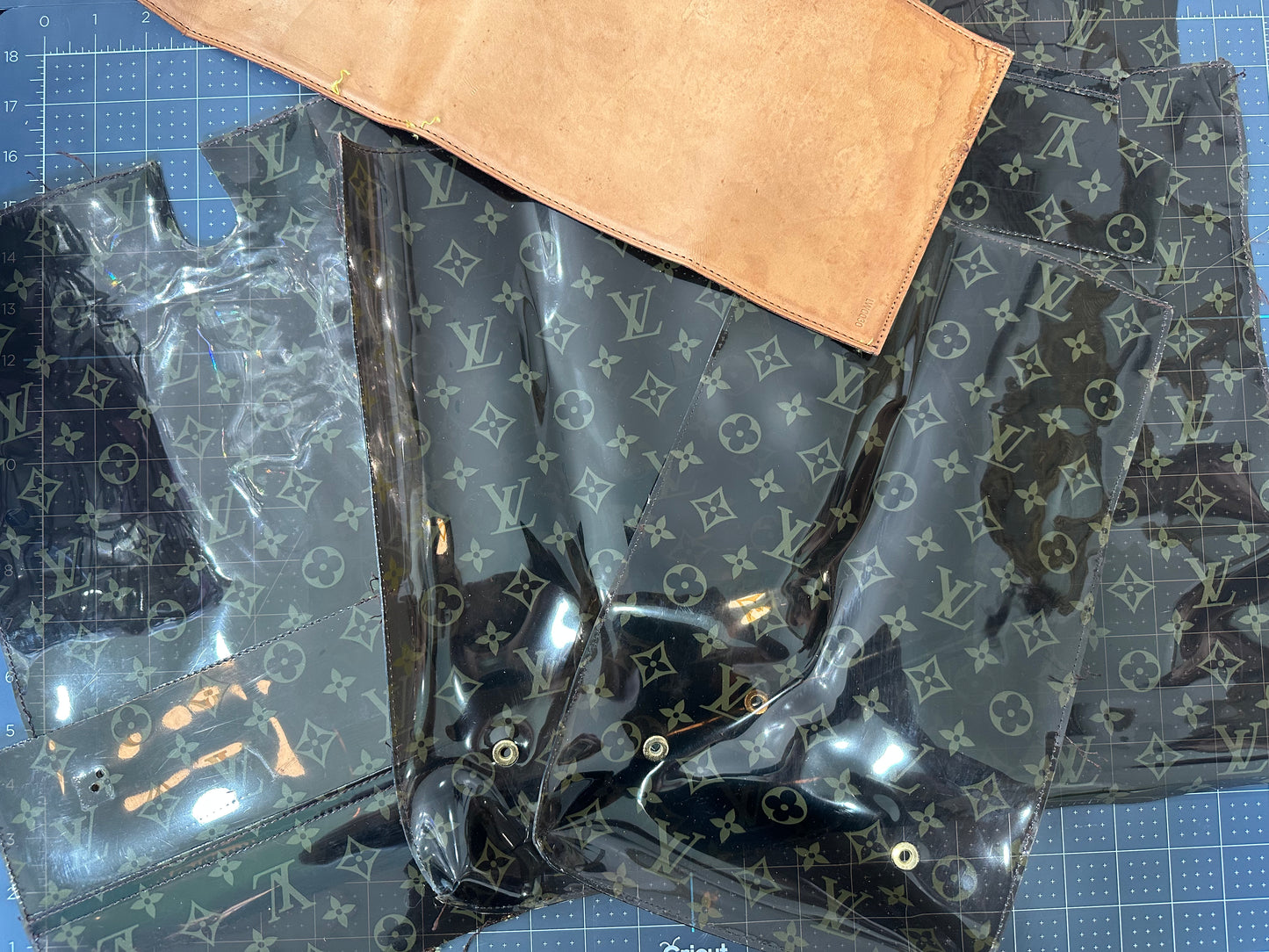 This is an authentic upcycled LV Cabas Ambre. It is a waterproof band made out an amber color plastic. It is paired with yellow gold rimmed Topaz crystal and matching hardware. All bands will come with a logo on the snap side.
