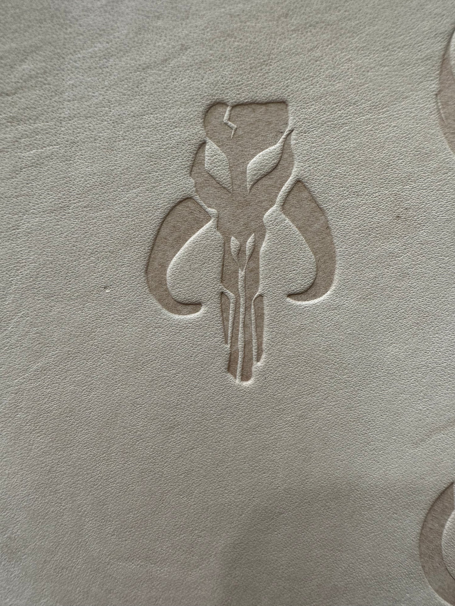 This is a Vachetta leather band that is embossed with your choice of galactic symbols. This leather will patina into a caramel color overtime. The size of the band is approximately 1.5 inches wide. The adapters are held with studs or crystals in silver, gunmetal, gold, or antique gold finishes.