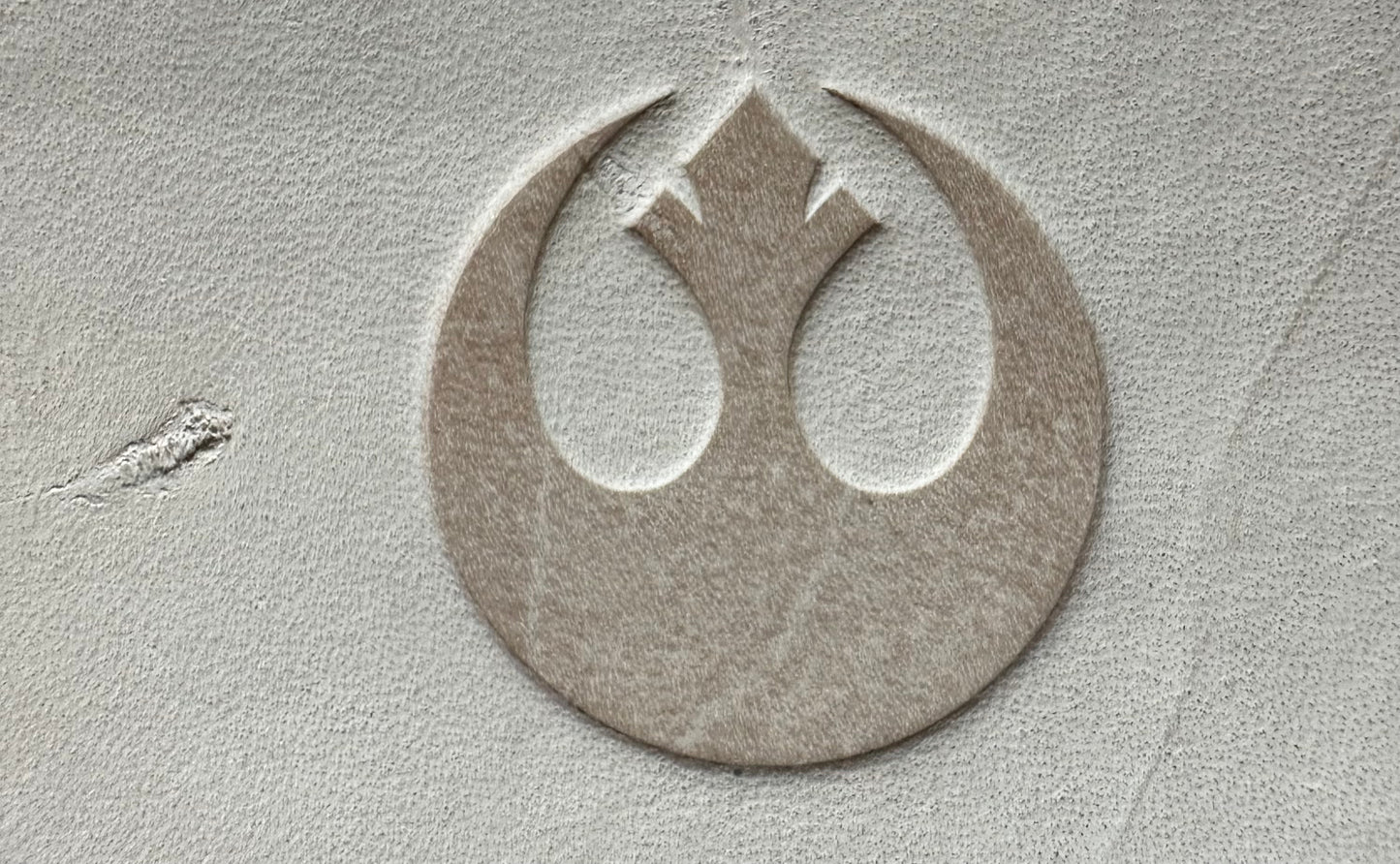 This is a Vachetta leather band that is embossed with your choice of galactic symbols. This leather will patina into a caramel color overtime. The size of the band is approximately 1.5 inches wide. The adapters are held with studs or crystals in silver, gunmetal, gold, or antique gold finishes.