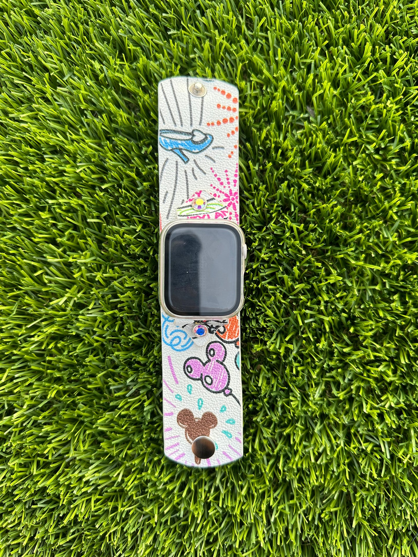 This is an authentic upcycled Dooney & Bourke band. It is made out of a coated canvas material and lined with a leather of your choice. You get to select your cut, your lining, and your embellishments. The edge paint will match the background color of the band.