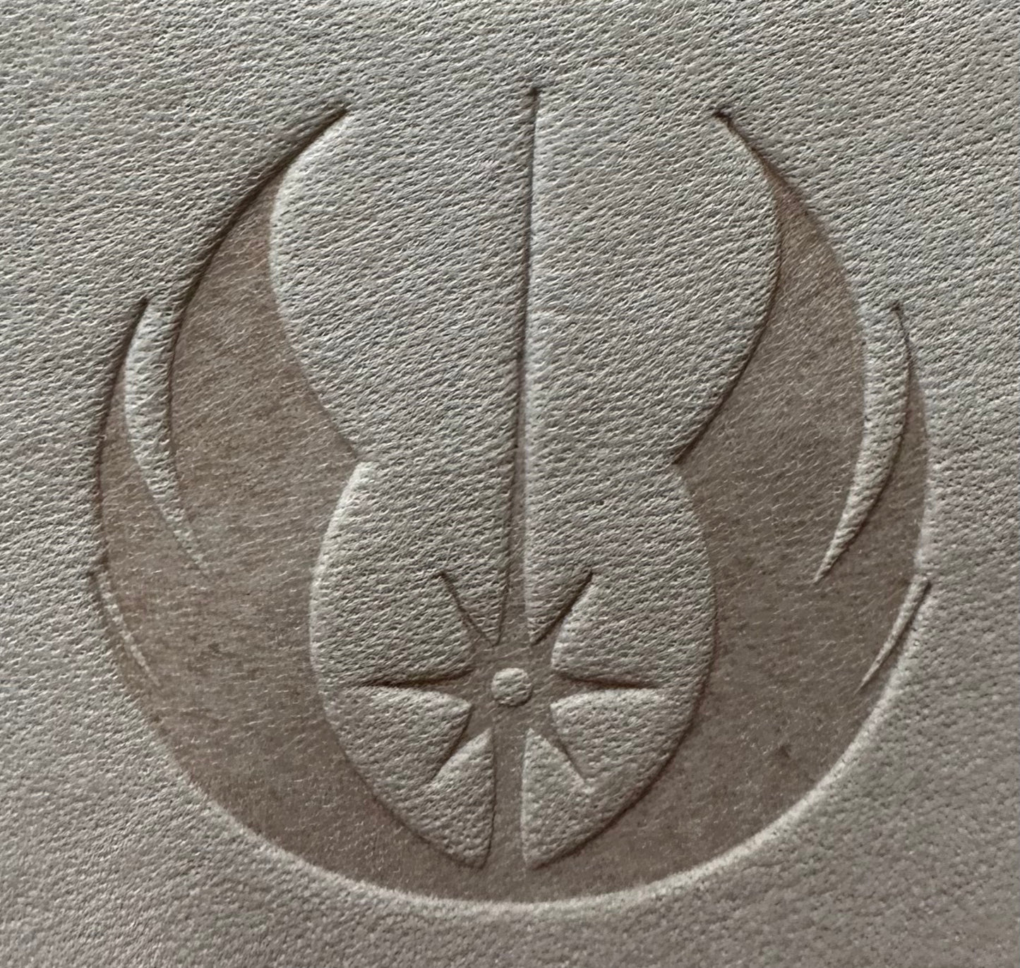 This is a Vachetta leather band that is embossed with your choice of galactic symbols. This leather will patina into a caramel color overtime. The size of the band is approximately 1.5 inches wide. The adapters are held with studs or crystals in silver, gunmetal, gold, or antique gold finishes.