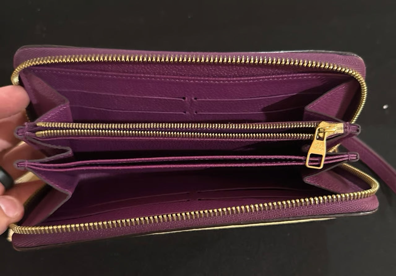 Louis Vuitton Zippy Monogram Empreinte Clemence Leather Zip Around Long Wallet
