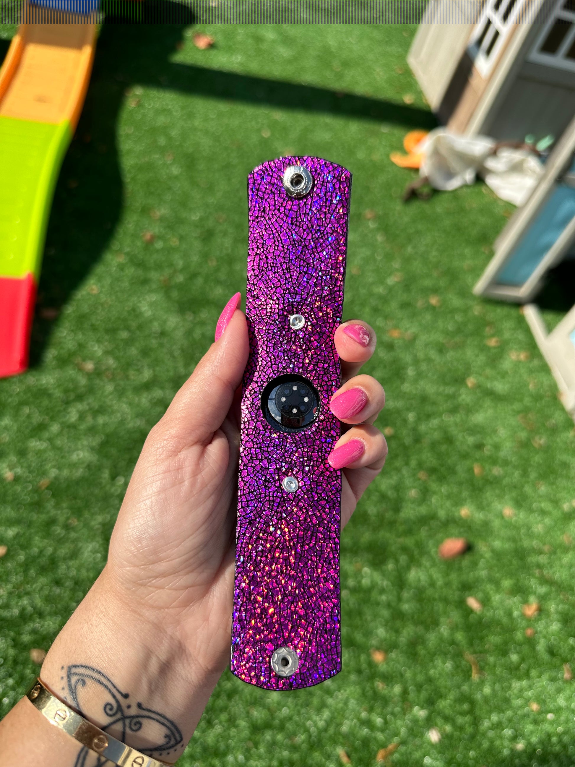 A multi-colored sparkling leather band with fuchsia sparkly lining. This beautiful band is embellished with fuchsia or rainbow crystals. The crystals are available with either a gold or silver rim.